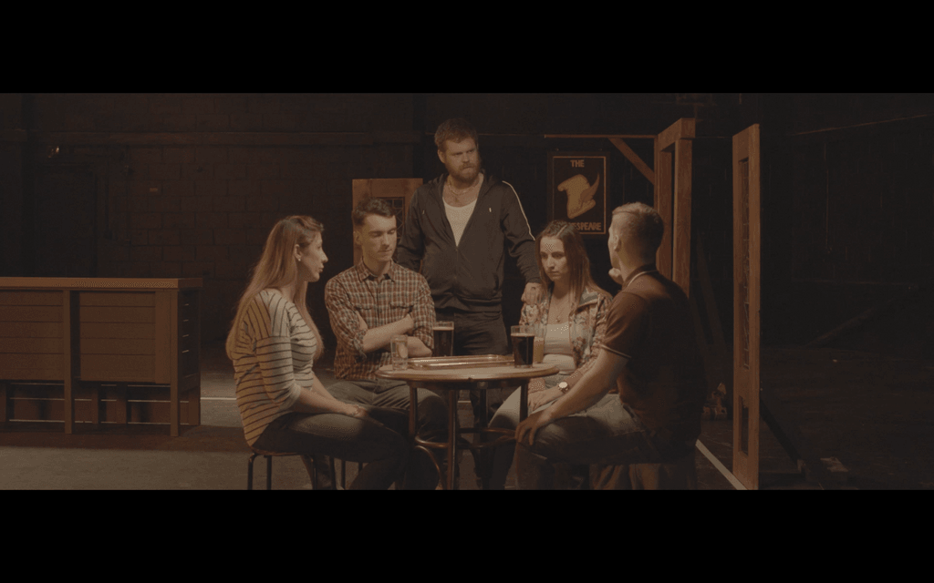 Group of people in a pub setting